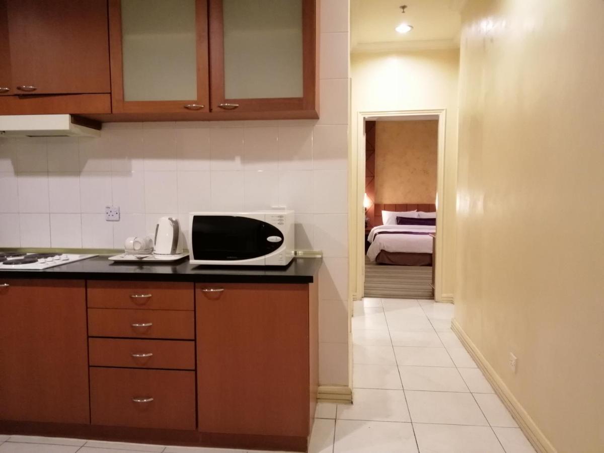 Stayinn Gateway Hotel Apartment Кучінг Екстер'єр фото