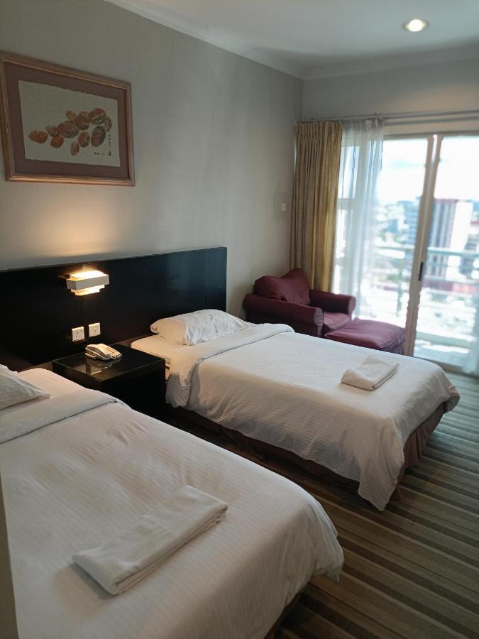 Stayinn Gateway Hotel Apartment Кучінг Екстер'єр фото
